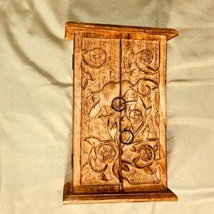 Carved wooden box with pentacle and vine motifs, dual doors